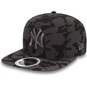 cappellino-nero-snapback-con-visiera-piatta-e-logo-grigio-9fifty-night-time-reflective-dei-new-york-yankees-mlb-di-new-era