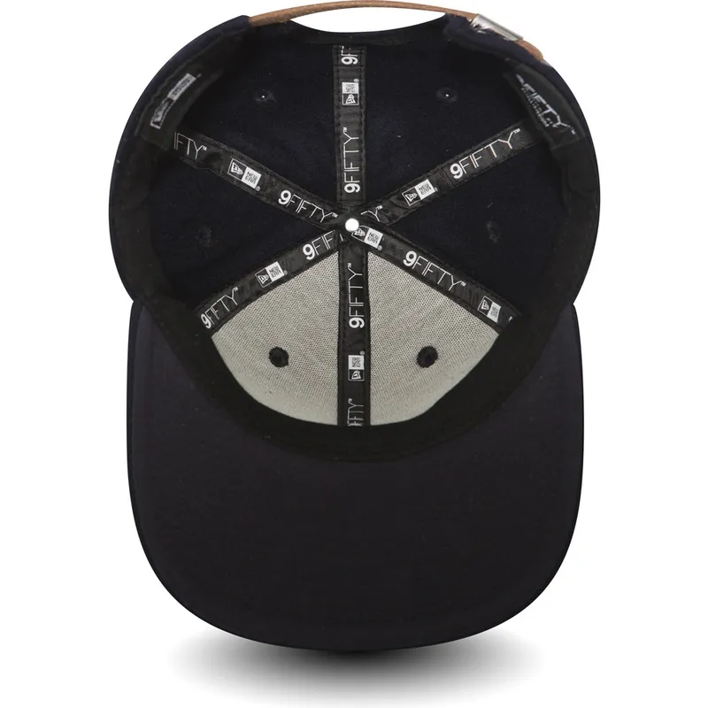 cappelli-piatta-blu-marino-cinghia-regolabile-9fifty-di-new-era