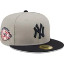 cappellino-piatto-grigio-e-blu-navy-aderente-59fifty-con-patch-laterale-dei-new-york-yankees-mlb-di-new-era