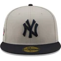 cappellino-piatto-grigio-e-blu-navy-aderente-59fifty-con-patch-laterale-dei-new-york-yankees-mlb-di-new-era