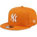 mutzen-flach-orange-snapback-9fifty-league-essential-der-new-york-yankees-mlb-von-new-era
