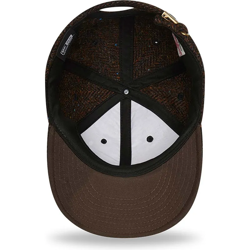 cappelli-piatta-marrone-cinghia-regolabile-9fifty-di-new-era