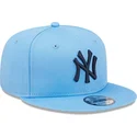 cappellino-snapback-piatto-blu-con-logo-blu-9fifty-league-essential-dei-new-york-yankees-mlb-di-new-era