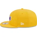 cappellino-piatto-giallo-snapback-9fifty-draft-edition-2023-dei-los-angeles-lakers-nba-di-new-era
