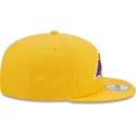 cappellino-piatto-giallo-snapback-9fifty-draft-edition-2023-dei-los-angeles-lakers-nba-di-new-era