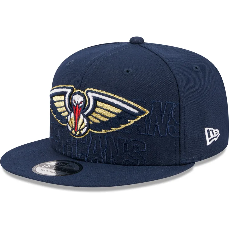 cappello-piatto-blu-navy-snapback-9fifty-draft-edition-2023-dei-new-orleans-pelicans-nba-di-new-era