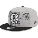 cappellino-piatto-grigio-e-nero-snapback-9fifty-draft-edition-2023-dei-brooklyn-nets-nba-di-new-era