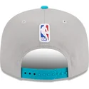 cappello-piatto-grigio-e-blu-snapback-9fifty-draft-edition-2023-dei-charlotte-hornets-nba-di-new-era