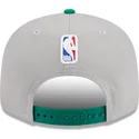 cappello-piatto-grigio-e-verde-snapback-9fifty-draft-edition-2023-dei-boston-celtics-nba-di-new-era
