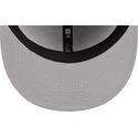 cappellino-piatto-grigio-e-blu-snapback-9fifty-draft-edition-2023-dei-golden-state-warriors-nba-di-new-era