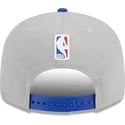 graue-und-blaue-flatcap-snapback-9fifty-draft-edition-2023-der-new-york-knicks-nba-von-new-era