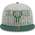 cappello-piatto-grigio-e-verde-snapback-9fifty-draft-edition-2023-di-milwaukee-bucks-nba-di-new-era