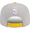 cappellino-piatto-grigio-e-giallo-snapback-9fifty-draft-edition-2023-dei-los-angeles-lakers-nba-di-new-era
