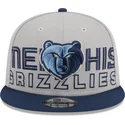 cappellino-piatto-grigio-e-blu-navy-snapback-9fifty-draft-edition-2023-dei-memphis-grizzlies-nba-di-new-era