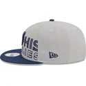 cappellino-piatto-grigio-e-blu-navy-snapback-9fifty-draft-edition-2023-dei-memphis-grizzlies-nba-di-new-era