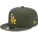 cappello-snapback-verde-con-visiera-piatta-e-logo-giallo-9fifty-side-patch-dei-los-angeles-dodgers-mlb-di-new-era