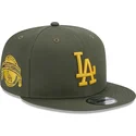 cappello-snapback-verde-con-visiera-piatta-e-logo-giallo-9fifty-side-patch-dei-los-angeles-dodgers-mlb-di-new-era