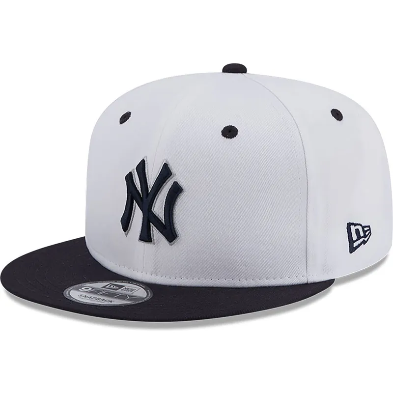 cappello-piatto-bianco-e-blu-navy-snapback-con-logo-blu-navy-9fifty-white-crown-patch-dei-new-york-yankees-mlb-di-new-era