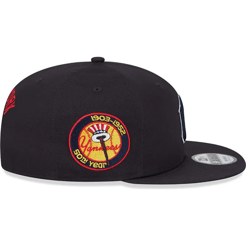 cappello-piatto-blu-navy-snapback-con-logo-blu-navy-9fifty-side-patch-script-dei-new-york-yankees-mlb-di-new-era