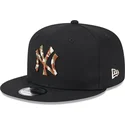 cappello-piatto-nero-snapback-con-logo-marrone-9fifty-seasonal-infill-di-new-york-yankees-mlb-di-new-era