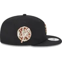 schwarze-snapback-kappe-mit-flachem-schirm-und-braunem-logo-9fifty-seasonal-infill-der-new-york-yankees-mlb-von-new-era