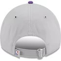 new-era-curved-brim-9twenty-tip-off-2023-los-angeles-lakers-nba-grey-and-purple-adjustable-cap