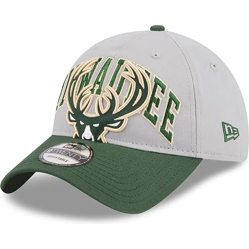 justerbar-gron-och-gra-kurvad-keps-9twenty-tip-off-2023-milwaukee-bucks-nba-fran-new-era