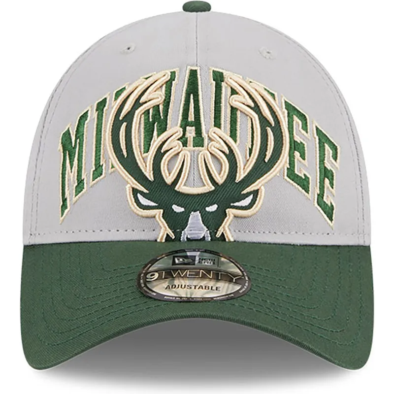 szara-i-zielona-zakrzywiona-czapka-regulowana-9twenty-tip-off-2023-milwaukee-bucks-nba-od-new-era