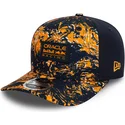 cappellino-snapback-9fifty-con-visiera-curva-arancione-e-blu-navy-all-over-print-di-red-bull-racing-formula-1-di-new-era