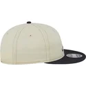 cappello-piatto-beige-e-blu-marino-9fifty-retro-crown-denim-di-atlanta-braves-mlb-di-new-era