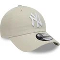 verstellbare-beige-9twenty-league-essential-kappe-mit-gebogenem-schirm-der-new-york-yankees-mlb-von-new-era