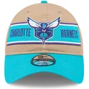 justerbar-brun-och-bla-bojd-keps-9twenty-draft-2024-av-charlotte-hornets-nba-fran-new-era