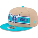 cappello-piatto-marrone-e-blu-snapback-9fifty-draft-2024-di-charlotte-hornets-nba-di-new-era