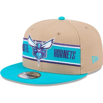 Gorra plana marrón y azul snapback 9FIFTY Draft 2024 de Charlotte Hornets NBA de New Era