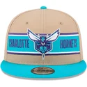 cappello-piatto-marrone-e-blu-snapback-9fifty-draft-2024-di-charlotte-hornets-nba-di-new-era