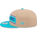 cappello-piatto-marrone-e-blu-snapback-9fifty-draft-2024-di-charlotte-hornets-nba-di-new-era