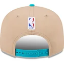braune-und-blaue-snapback-kappe-9fifty-draft-2024-der-charlotte-hornets-nba-von-new-era