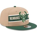 braune-und-grune-flache-snapback-kappe-9fifty-draft-2024-von-milwaukee-bucks-nba-von-new-era