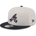 cappello-piatto-beige-e-blu-navy-snapback-9fifty-4th-of-july-degli-atlanta-braves-mlb-di-new-era