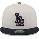 cappello-piatto-beige-e-blu-marino-snapback-9fifty-4th-of-july-dei-los-angeles-dodgers-mlb-di-new-era