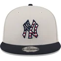 cappello-piatto-beige-e-blu-marino-snapback-9fifty-4th-of-july-dei-new-york-yankees-mlb-di-new-era