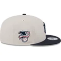 cappello-piatto-beige-e-blu-marino-snapback-9fifty-4th-of-july-dei-new-york-yankees-mlb-di-new-era