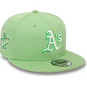 cappello-snapback-verde-chiaro-9fifty-con-patch-world-series-degli-oakland-athletics-mlb-di-new-era