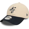 new-era-curved-brim-9twenty-peached-cotton-beige-and-navy-blue-adjustable-cap