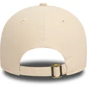 casquette-courbee-beige-et-bleue-marine-ajustable-9twenty-peached-cotton-new-era