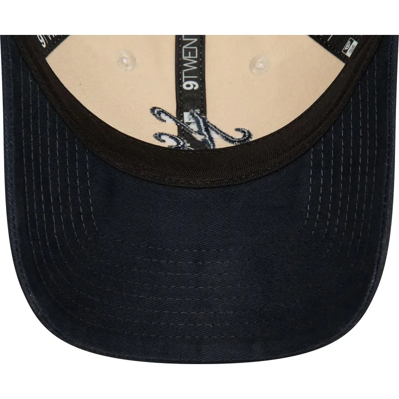 cappellino-curvo-beige-e-blu-navy-regolabile-9twenty-peached-cotton-di-new-era