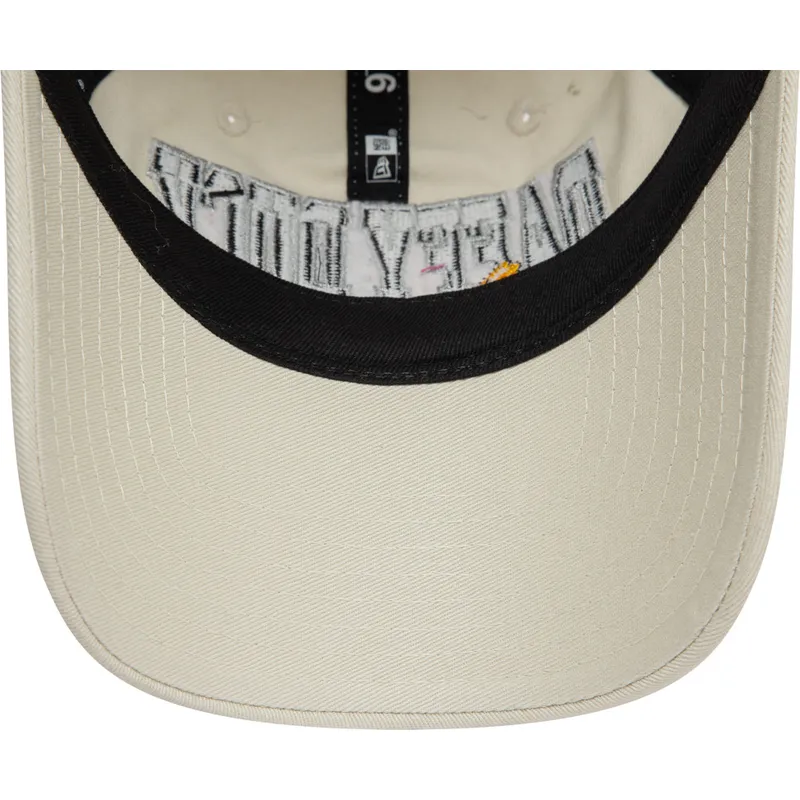cappellino-curva-beige-regolabile-9twenty-washed-di-daffy-duck-looney-tunes-di-new-era