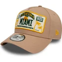 ljusbrun-bojd-skarm-snapback-9forty-a-frame-license-plate-miami-stader-och-strander-fran-new-era