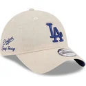 cappellino-curva-beige-regolabile-con-logo-blu-9twenty-linen-spring-training-fan-pack-2025-dei-los-angeles-dodgers-mlb-di-new-er