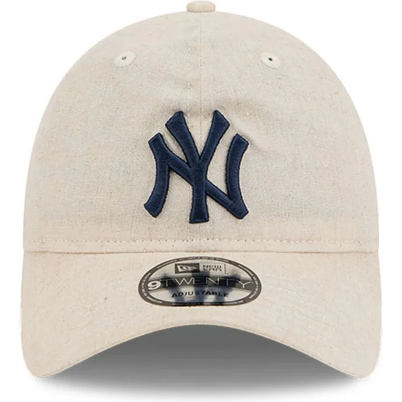 beige-justerbar-bojd-keps-med-marinbla-logo-9twenty-linen-spring-training-fan-pack-2025-fran-new-york-yankees-mlb-av-new-era